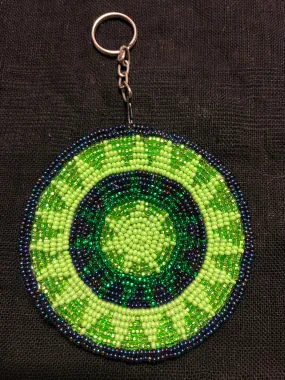 Guatemalan handcrafted glass bead round change purse with key ring. 3.5” diameter.