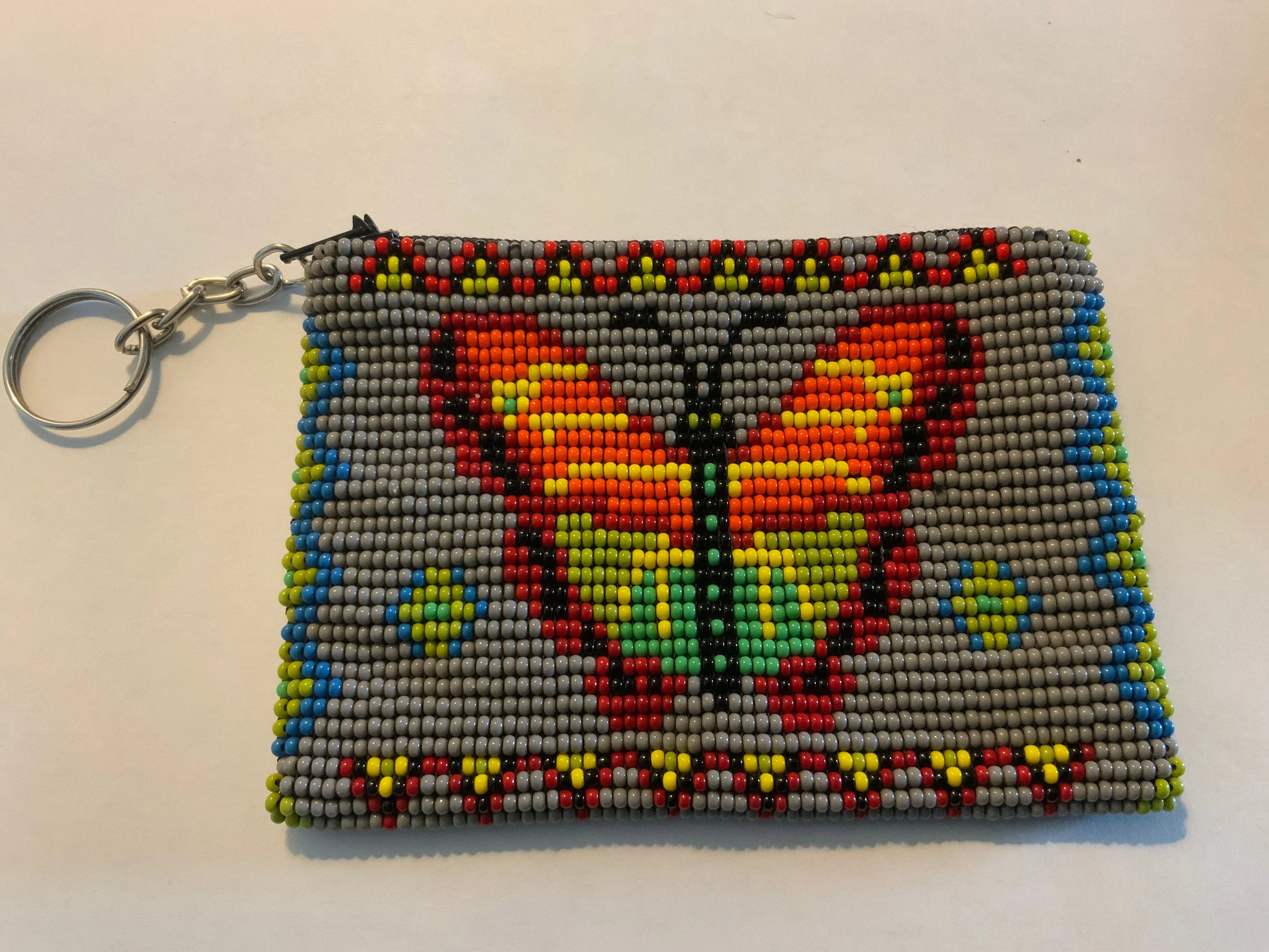 Guatemalan Pictoral handcrafted glass bead change purse with key ring.