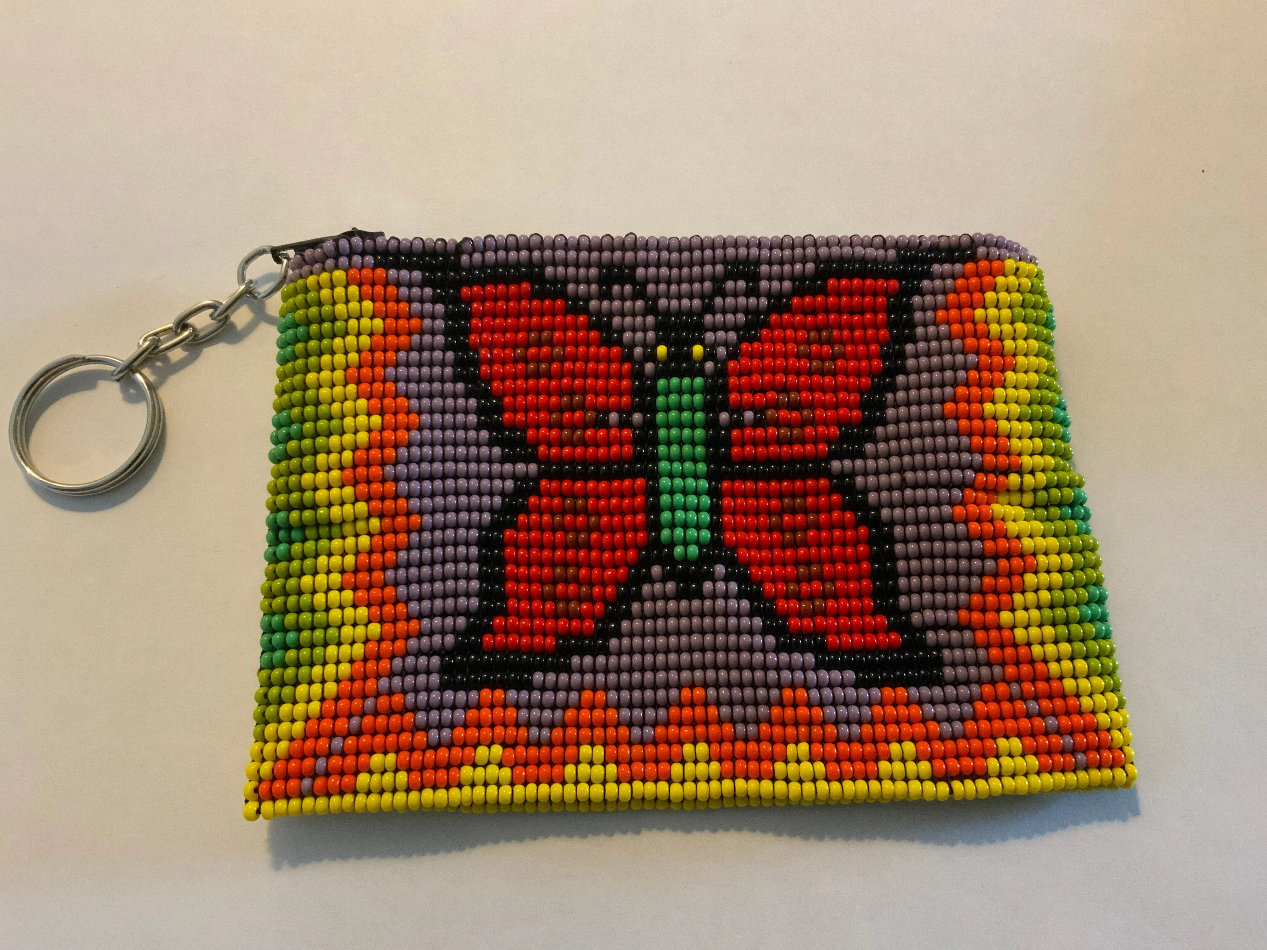 Guatemalan Pictoral handcrafted glass bead change purse with key ring.