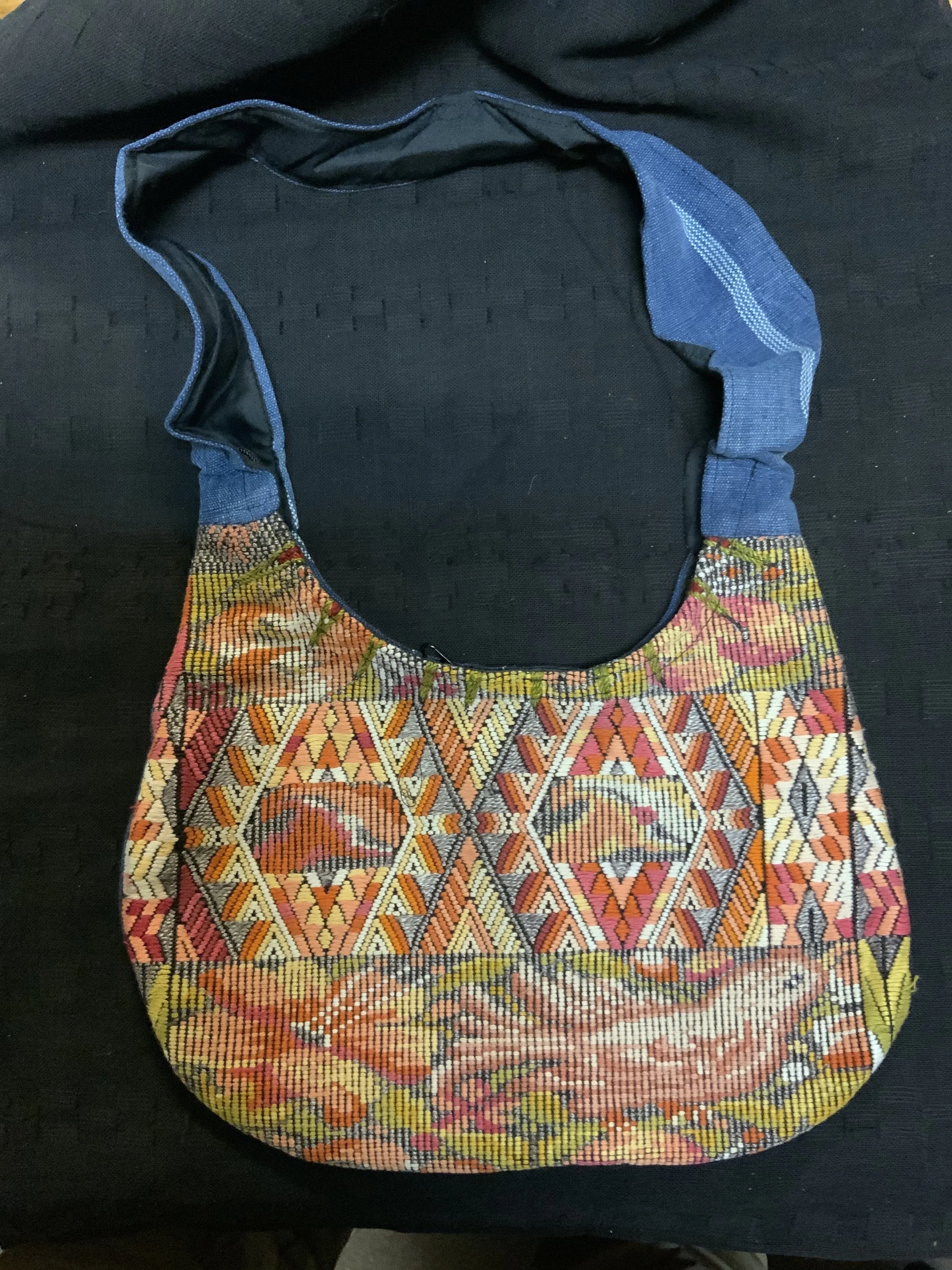 Guatemalan vintage huipil fabric made into a shoulder purse. 11” wide by 7” at its narrowest point. Note the strap is not full l